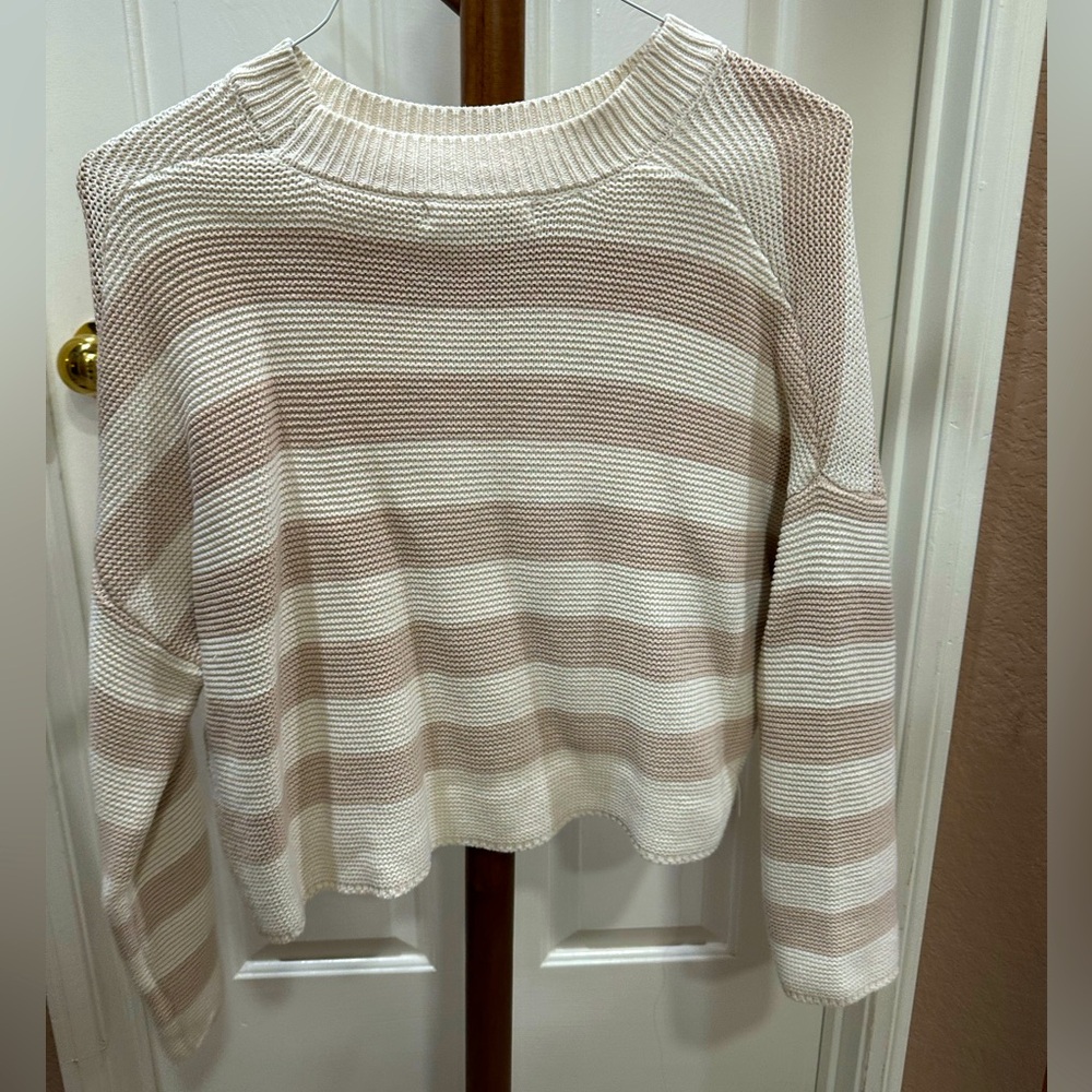 Cute knitted sweater.